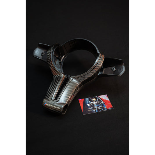 Front view of full carbon fibre steering wheel trim for BMW F series 