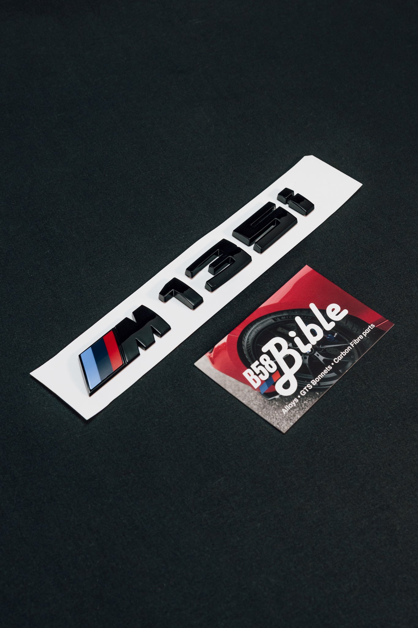 Black M135i Badge