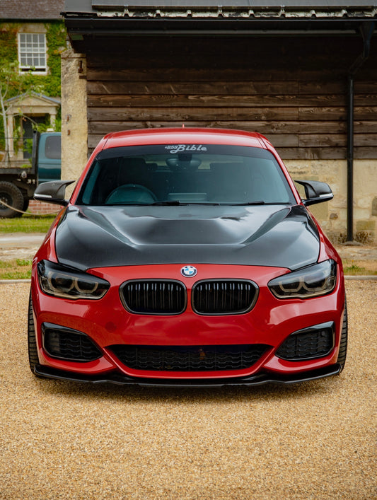 Front view of Melbourne red BMW M140i with a carbon fibre GTS style bonnet 